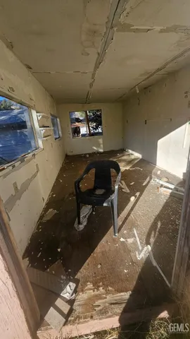 a view of a hallway with stairs