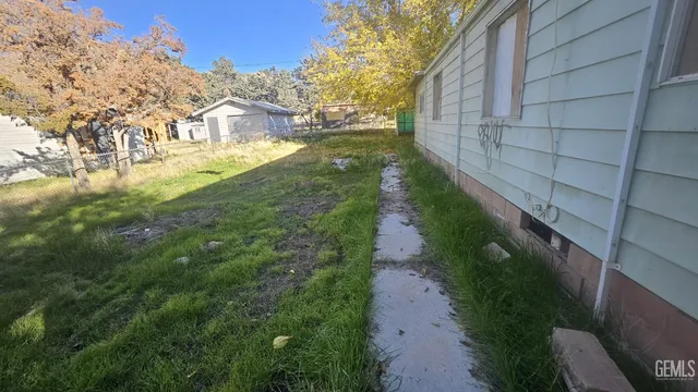 a view of a yard with an trees