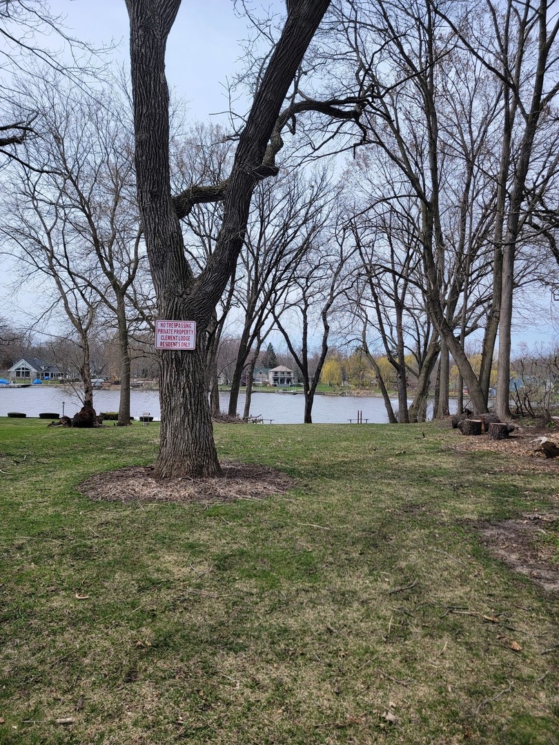 511 North River Road McHenry, IL 60051 - Photo 22 of 22 a big house with trees in the background