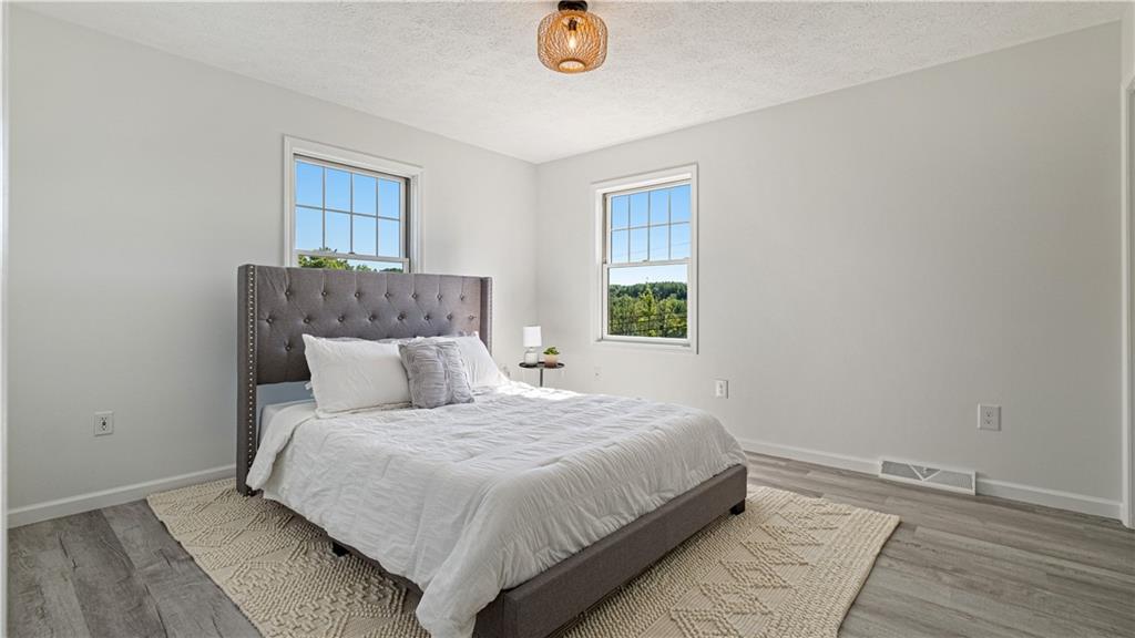 695 North Ben Franklin Road Indiana, PA 15701 - Photo 11 of 25 a bedroom with a bed and a window