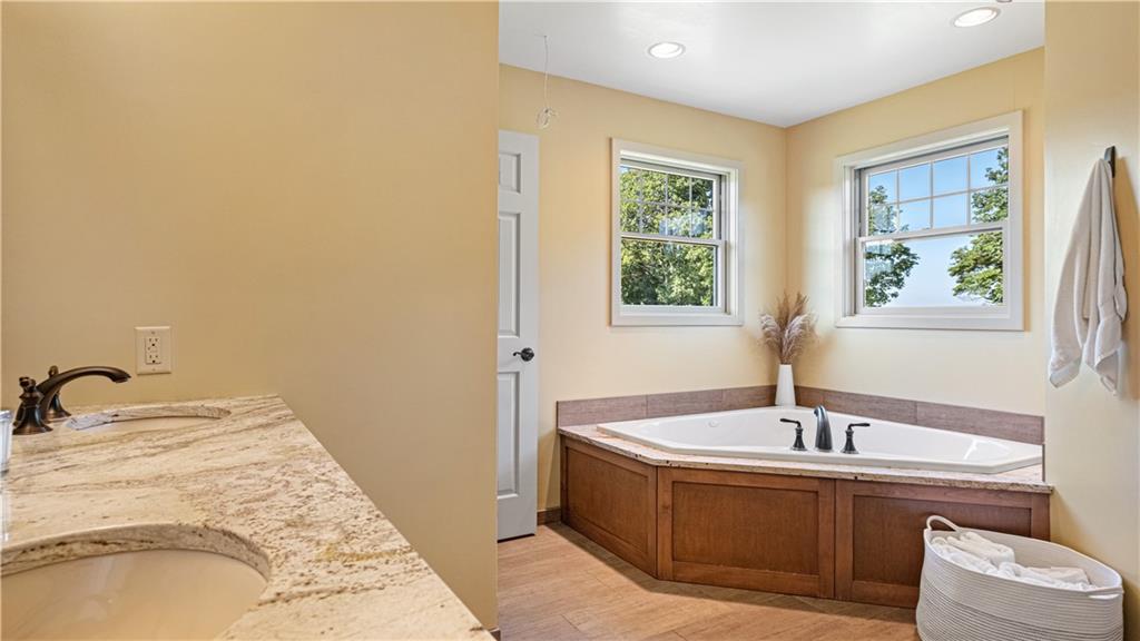 695 North Ben Franklin Road Indiana, PA 15701 - Photo 16 of 25 a bathroom with a tub sink and window