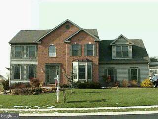 513 Monocacy Trail Spring Grove, PA 17362 - Photo 1 of 1 a front view of a house with a yard