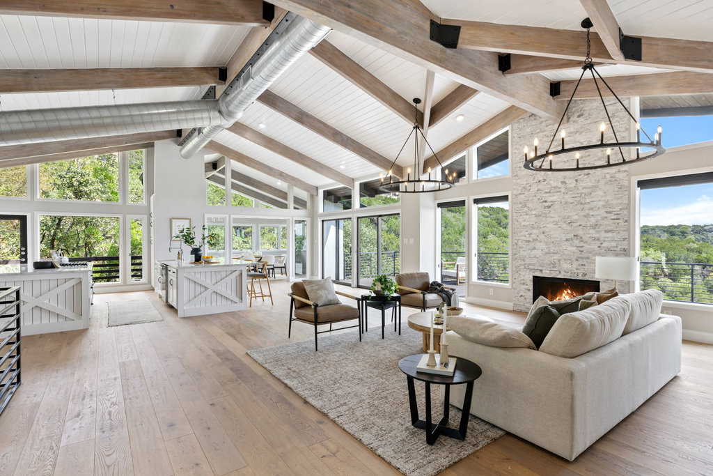 6905 Ladera Norte Austin, TX 78731 - Photo 14 of 40 a living room with furniture and a large window