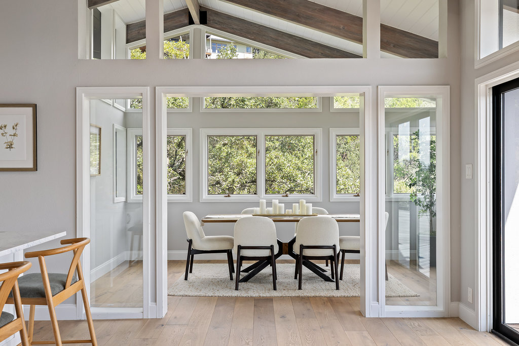 6905 Ladera Norte Austin, TX 78731 - Photo 21 of 40 a dining room with furniture and window