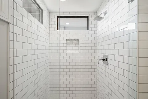 wooden floor in a hall with an entryway
