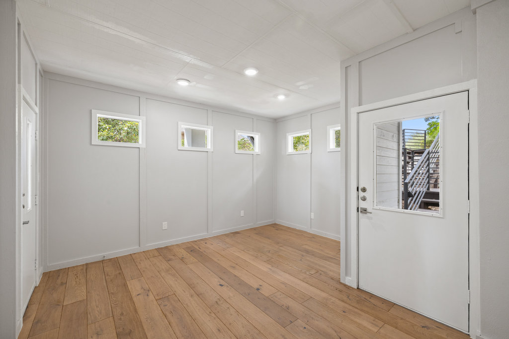 6905 Ladera Norte Austin, TX 78731 - Photo 32 of 40 wooden floor in a hall with an entryway