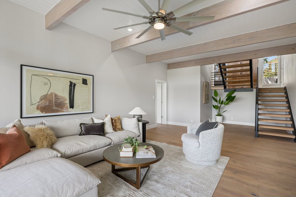 6905 Ladera Norte Austin, TX 78731 - Photo 9 of 40 a living room with furniture and wooden floor