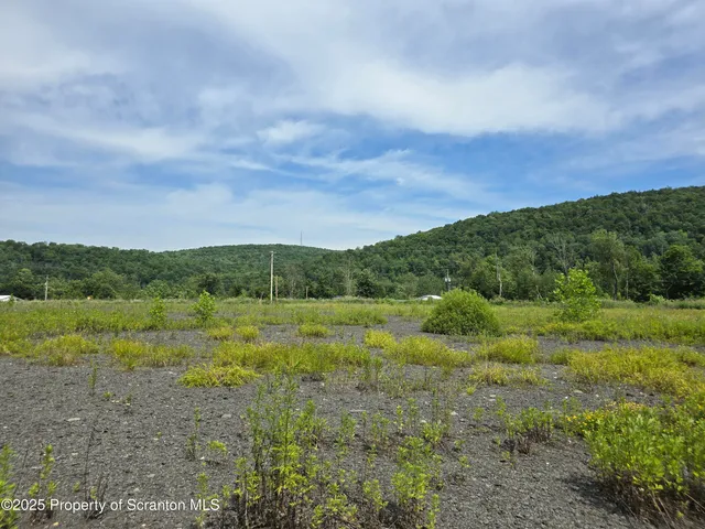 a view of an outdoor space with a lake view