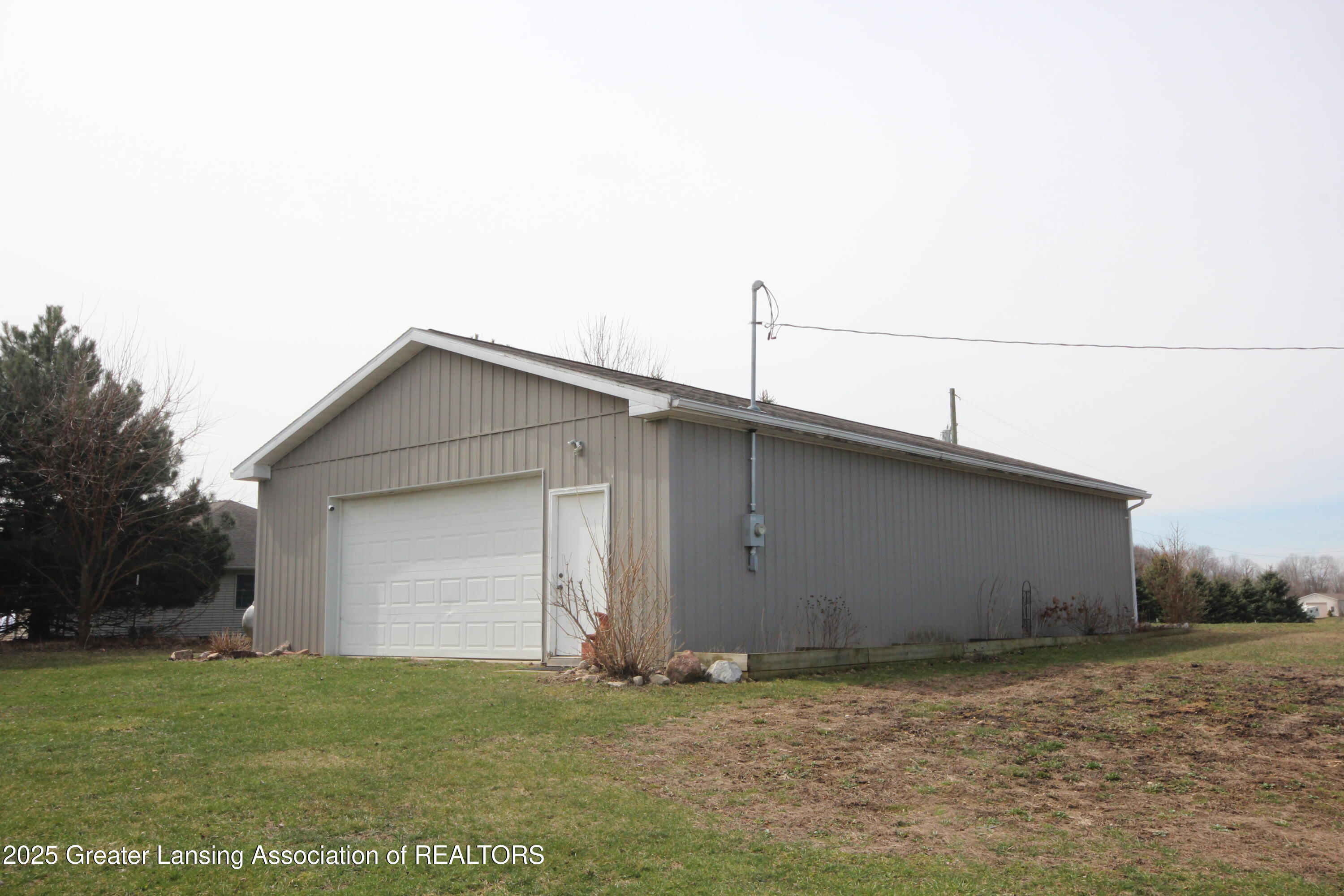 1762 North Hartel Road Charlotte, MI 48813 - Photo 3 of 13 Front & Rear Overhead Doors