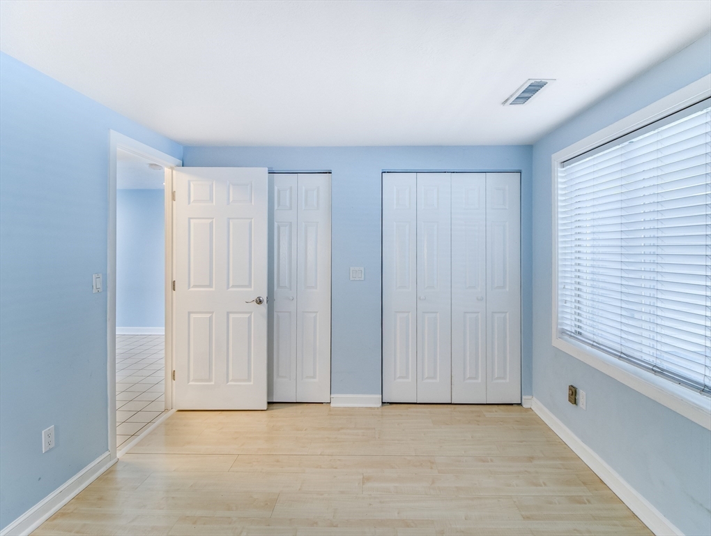 16 Milford Street, Unit 9 Hull, MA 02045 - Photo 20 of 42 an empty room with window