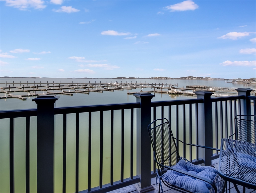 16 Milford Street, Unit 9 Hull, MA 02045 - Photo 40 of 42 a view of a balcony with a chairs