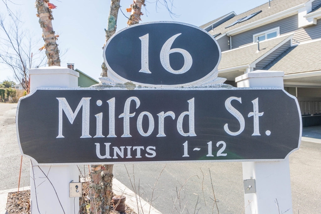 16 Milford Street, Unit 9 Hull, MA 02045 - Photo 42 of 42 a sign broad on a brick wall