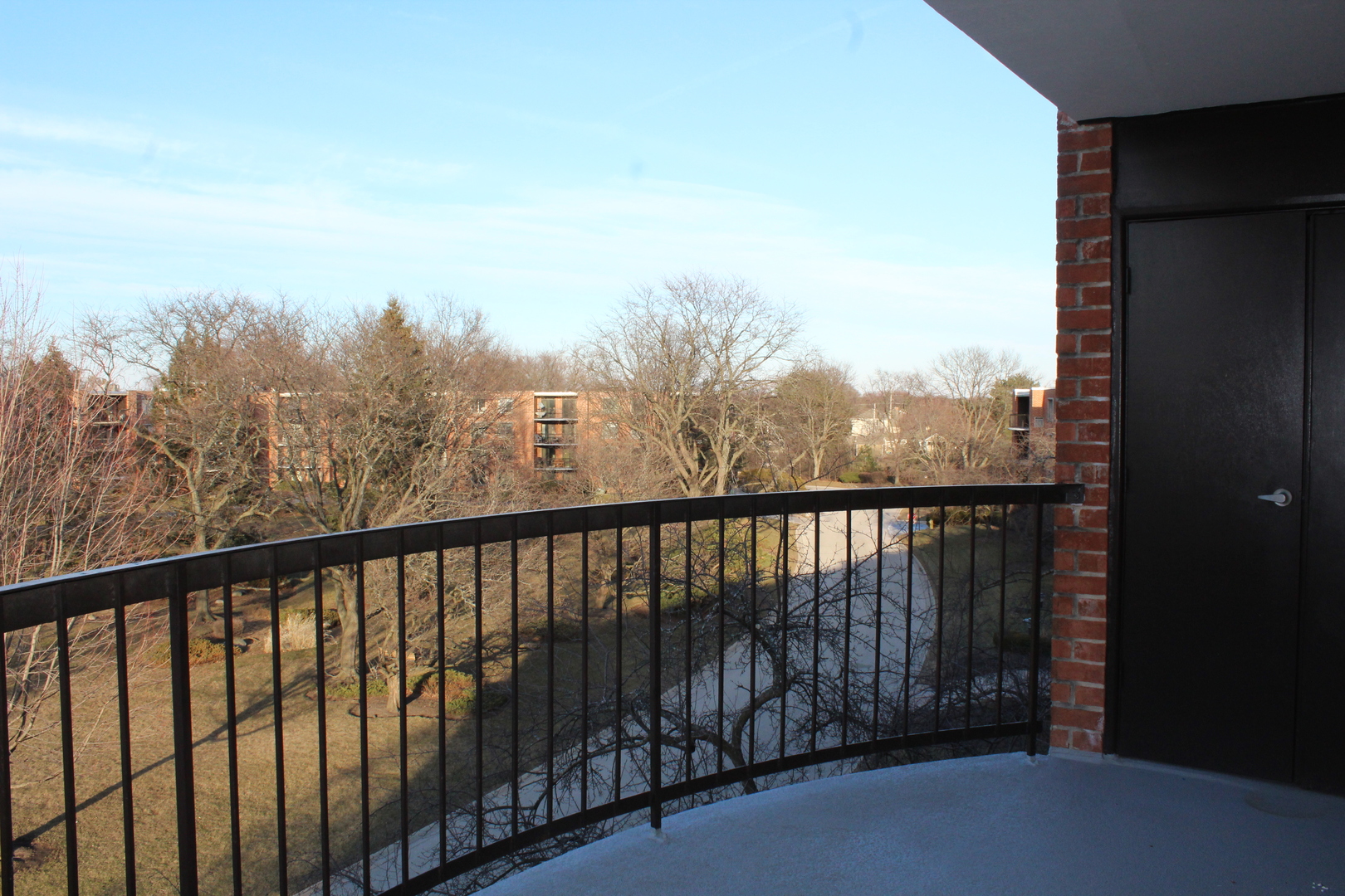 1605 East Central Road, Unit 413B Arlington Heights, IL 60005 - Photo 14 of 15 a balcony with outdoor space