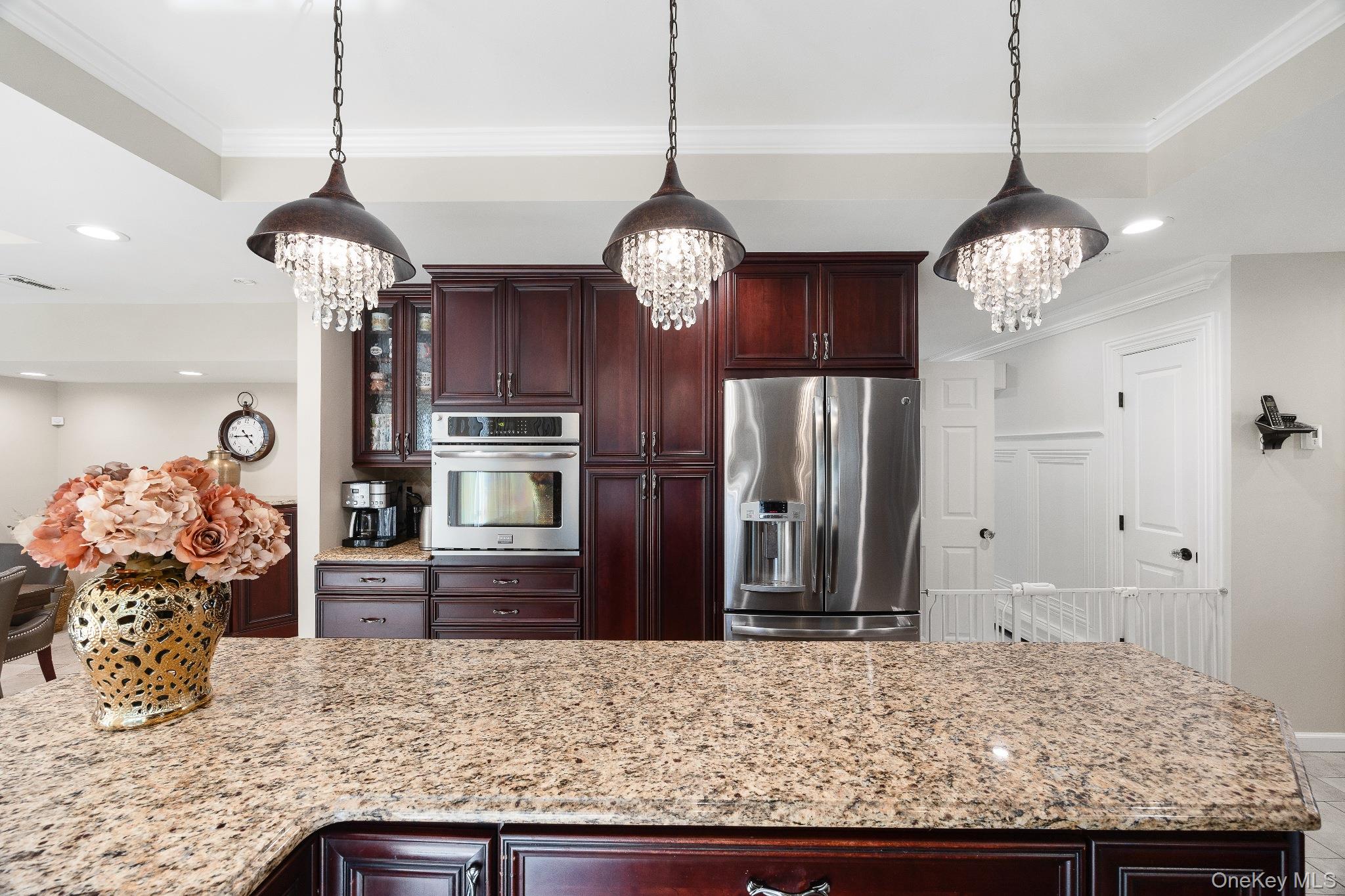 461 Wolf Hill Road Dix Hills, NY 11746 - Photo 12 of 37 a view of a hallway with a chandelier