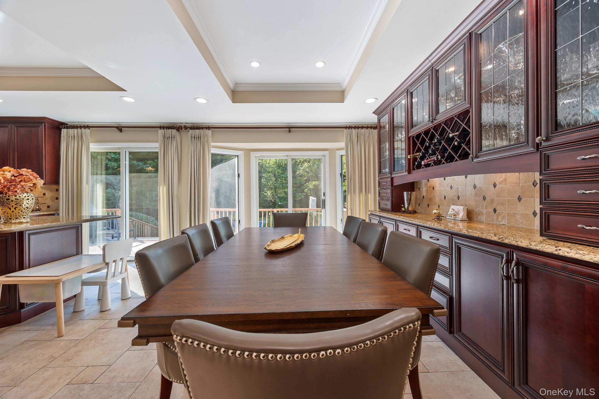 461 Wolf Hill Road Dix Hills, NY 11746 - Photo 13 of 37 a dining room with furniture and wooden floor