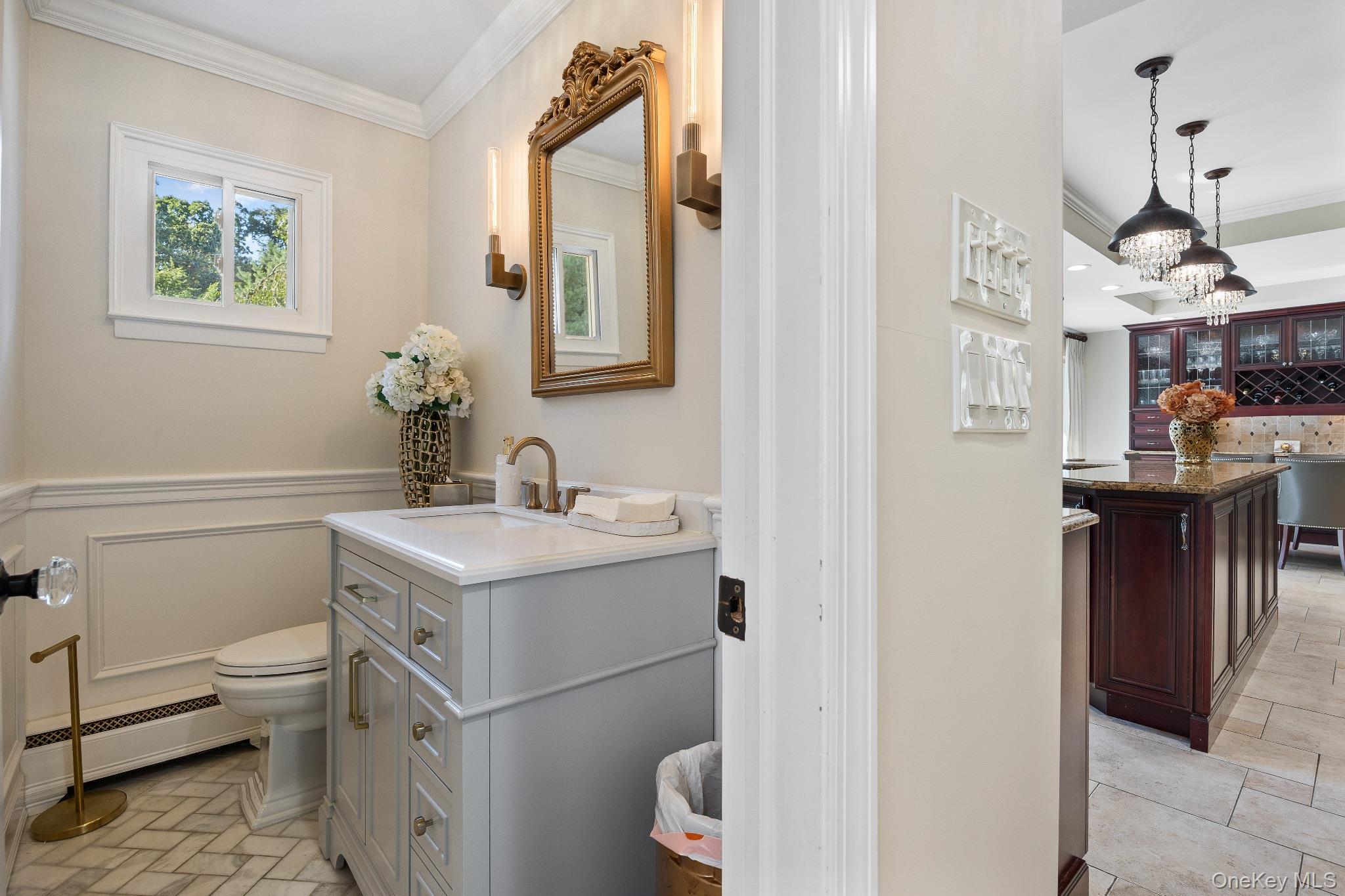 461 Wolf Hill Road Dix Hills, NY 11746 - Photo 15 of 37 a bathroom with a sink toilet and vanity
