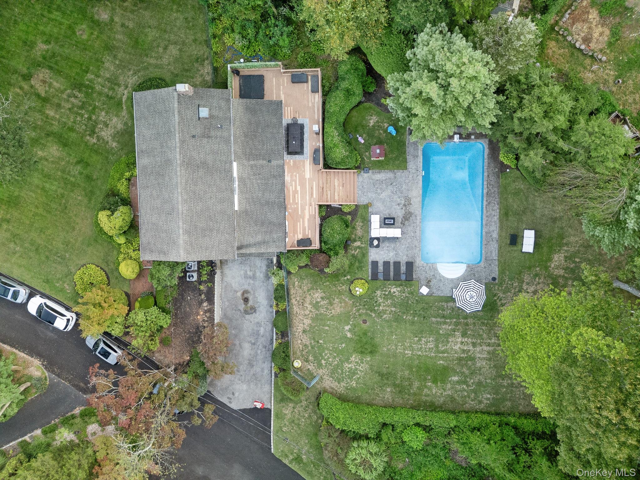 461 Wolf Hill Road Dix Hills, NY 11746 - Photo 37 of 37 an aerial view of a house with a yard and large tree
