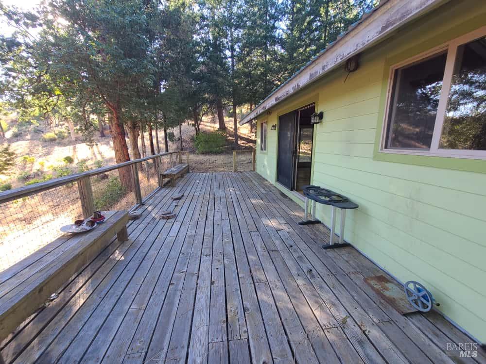 41390 Mendocino Pass Road Covelo, CA 95428 - Photo 24 of 44 a view of outdoor space with wooden floor and trees