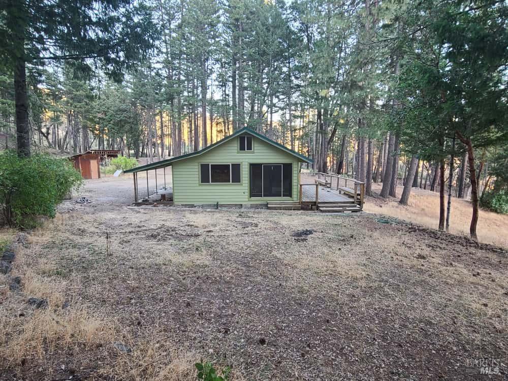 41390 Mendocino Pass Road Covelo, CA 95428 - Photo 39 of 44 a house with trees in the background