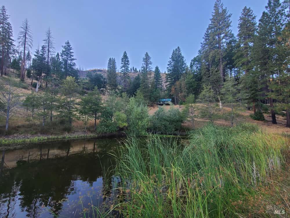41390 Mendocino Pass Road Covelo, CA 95428 - Photo 43 of 44 a view of a lake with a city