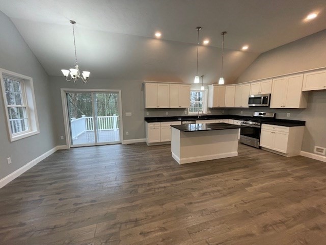 2 Peyton Lane Wareham, MA 02571 - Photo 4 of 10 a kitchen with stainless steel appliances granite countertop a stove top oven a sink a counter space and cabinets
