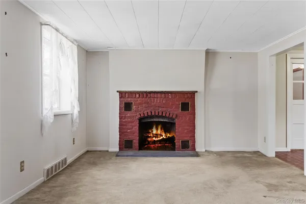 a living room with a fireplace