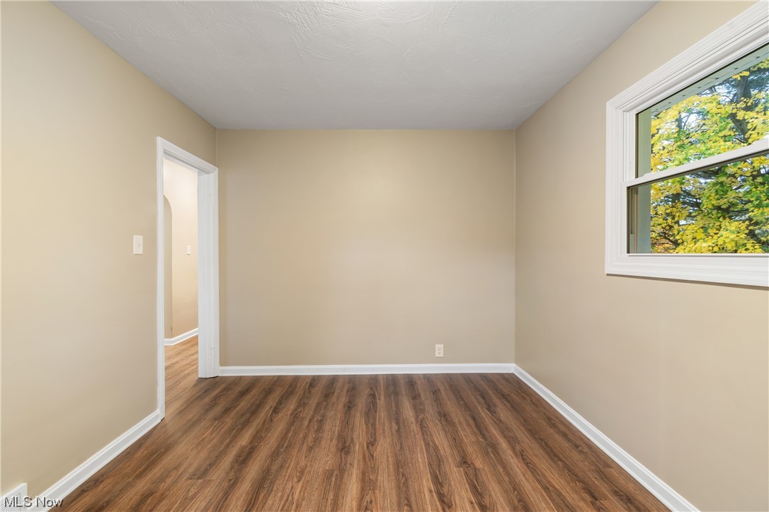 916 Renninger Road Akron, OH 44319 - Photo 20 of 31 Unfurnished room with dark hardwood / wood-style floors