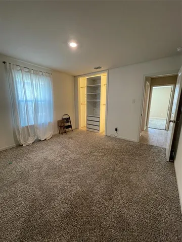 an empty room with an entryway