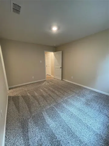 a view of a room with rack on the wall