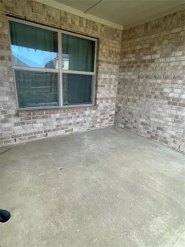 a view of a yard with an outdoor space
