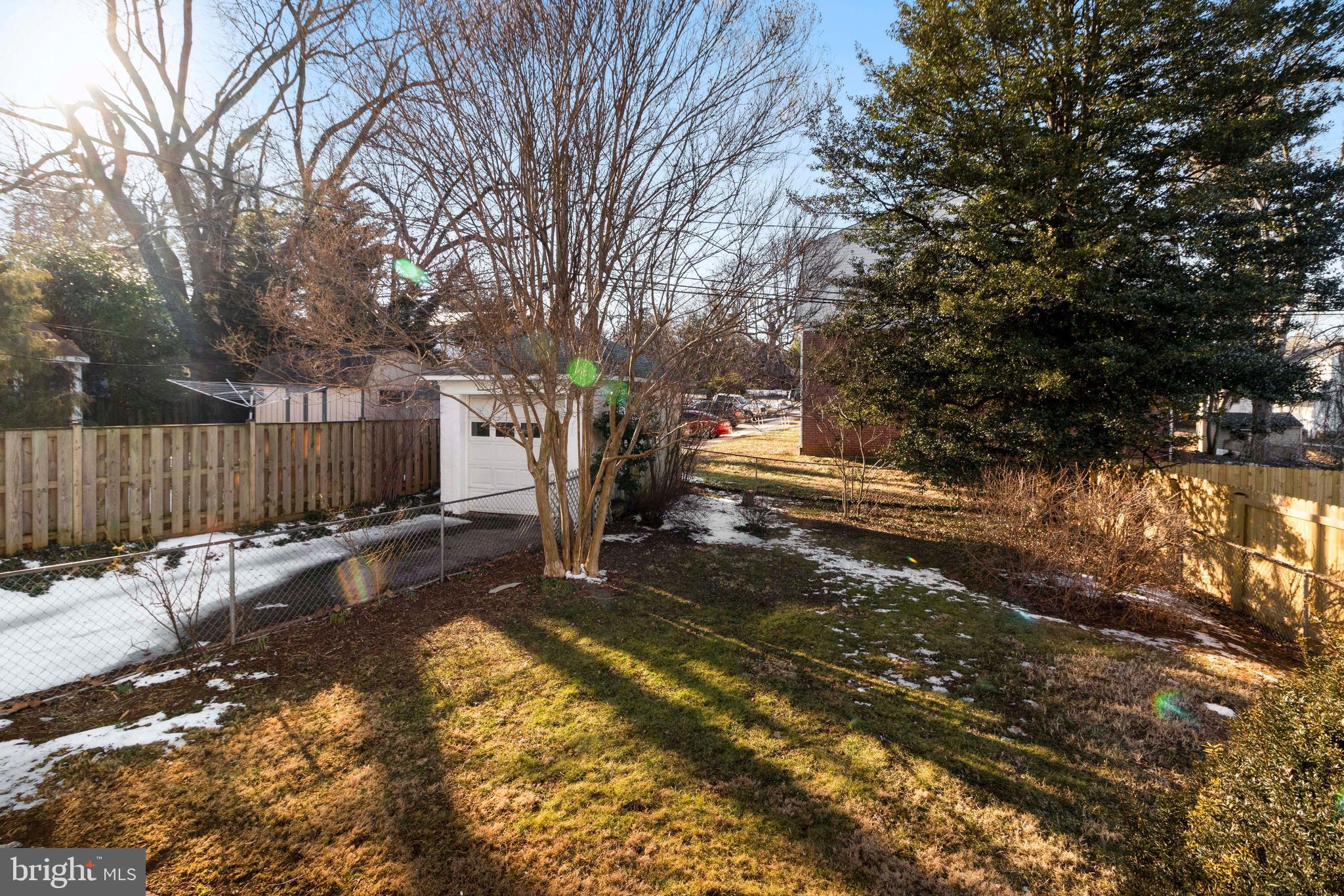 5314 Brabant Road Baltimore, MD 21229 - Photo 21 of 22 a backyard of a house with table and chairs