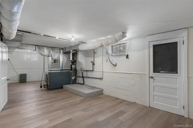 a view of a livingroom with wooden floor