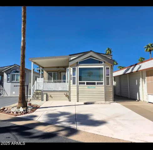 a front view of a house with garage