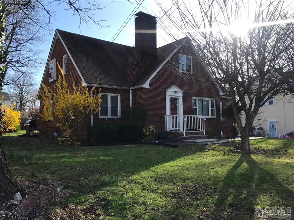 95 Highfield Road Colonia, NJ 07067 - Photo 5 of 5 a front view of a house with garden