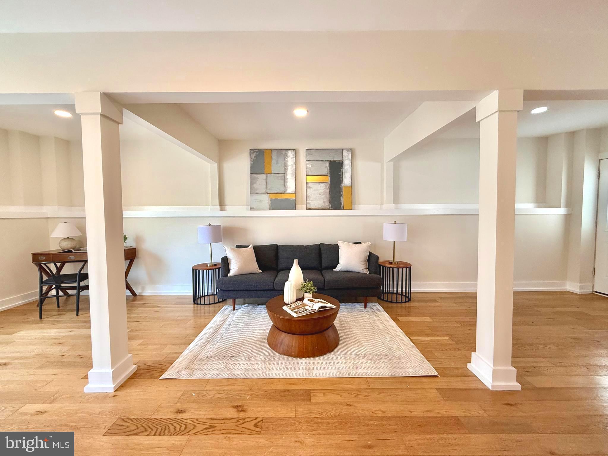 310 South Alfred Street Alexandria, VA 22314 - Photo 18 of 63 a living room with furniture and a view of kitchen