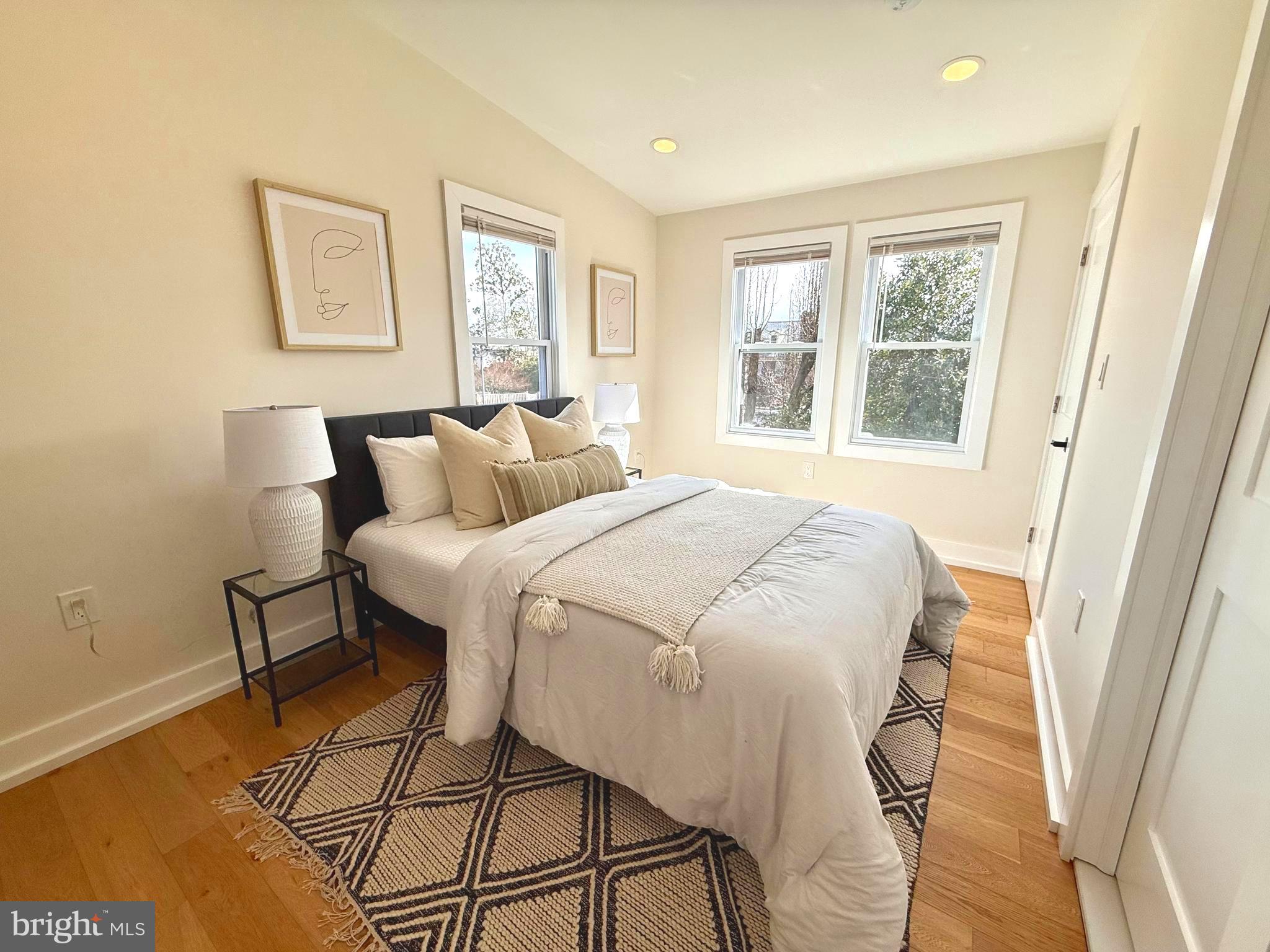 310 South Alfred Street Alexandria, VA 22314 - Photo 38 of 63 a bedroom with a bed and a window