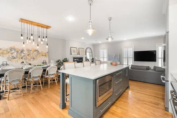 a spacious bedroom with a bed and furniture