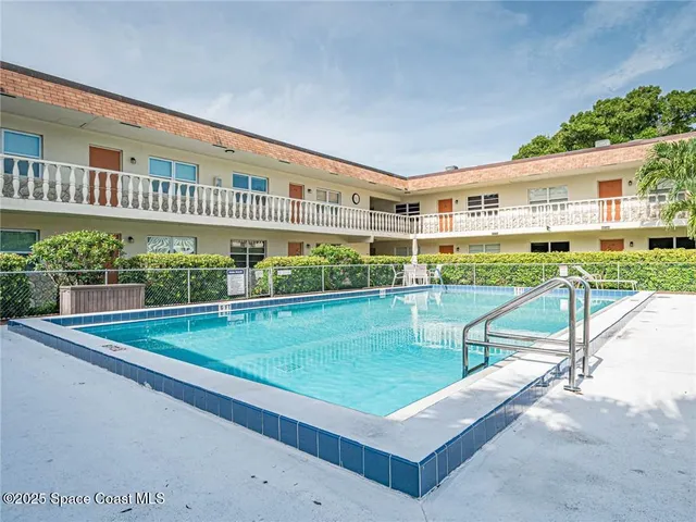 a view of a house with a swimming pool