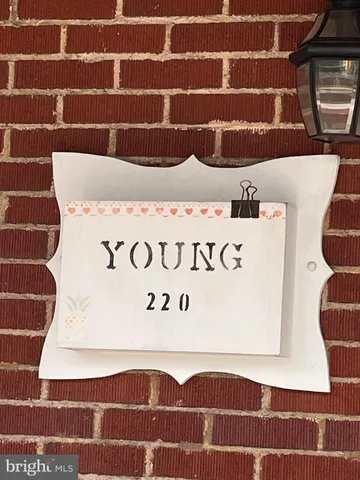 a view of utility room with wooden floor