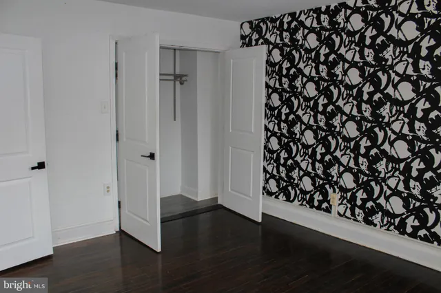 a view of a porch with wooden floor
