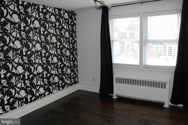 a view of a room with rack on the wall