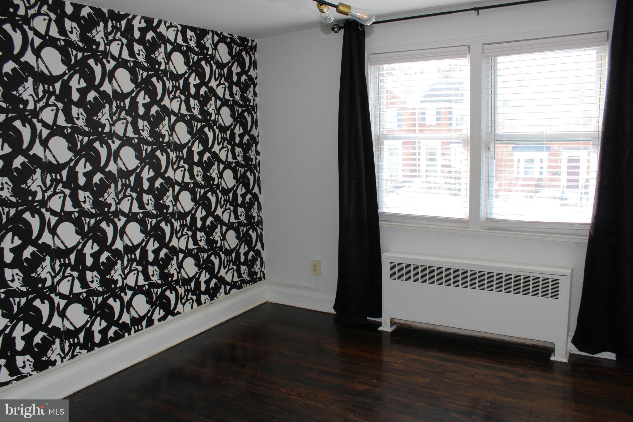 6161 Parkway Drive, Unit 2 Baltimore, MD 21212 - Photo 16 of 24 a view of a porch with wooden floor