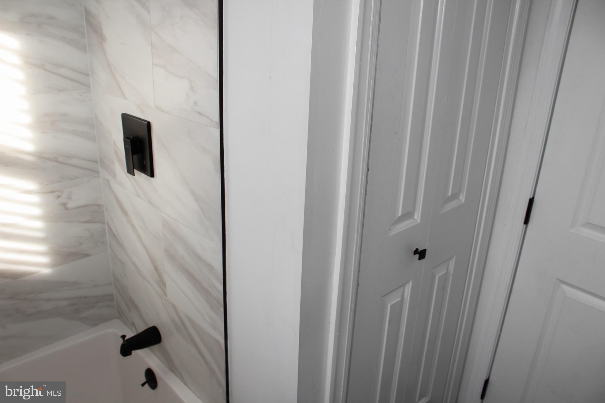 6161 Parkway Drive, Unit 2 Baltimore, MD 21212 - Photo 23 of 24 a bathroom with a shower