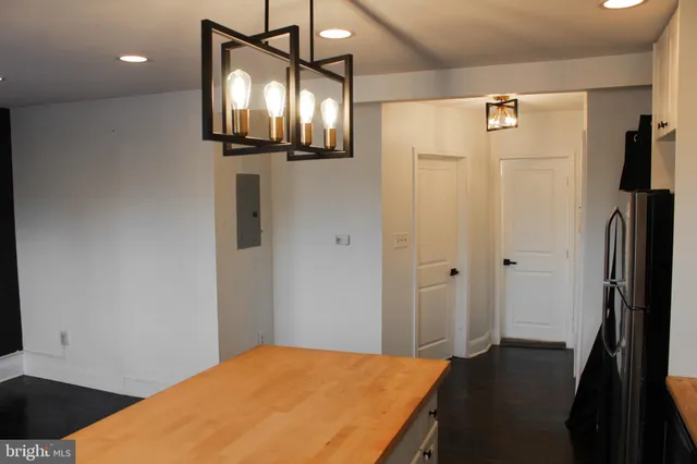 a kitchen with a stove and a microwave