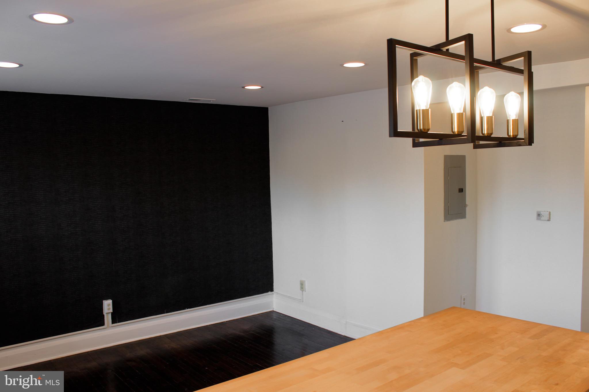6161 Parkway Drive, Unit 2 Baltimore, MD 21212 - Photo 10 of 24 a view of empty room with wooden floor