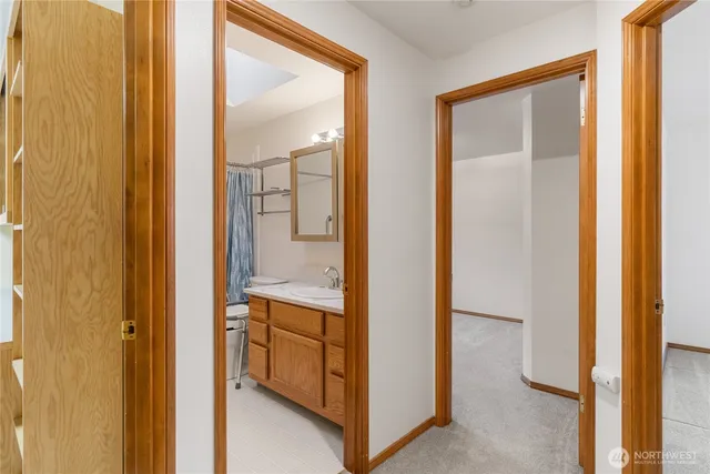 an empty room with a bathroom