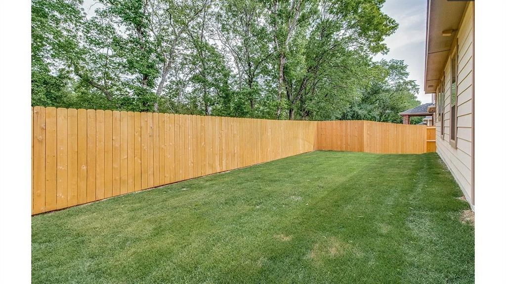 709 Copley Street Sherman, TX 75090 - Photo 27 of 27 a view of green field with small trees