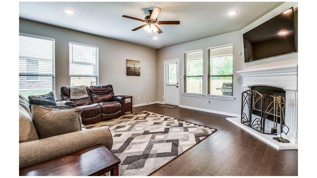 709 Copley Street Sherman, TX 75090 - Photo 3 of 27 a living room with furniture fireplace and flat screen tv