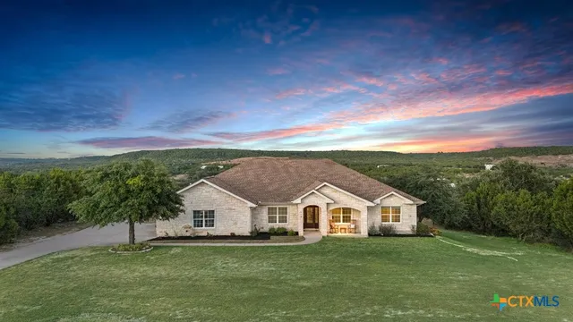 a view of a house with a big yard
