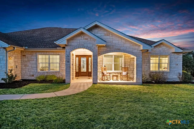 a bed room with furniture and a fireplace